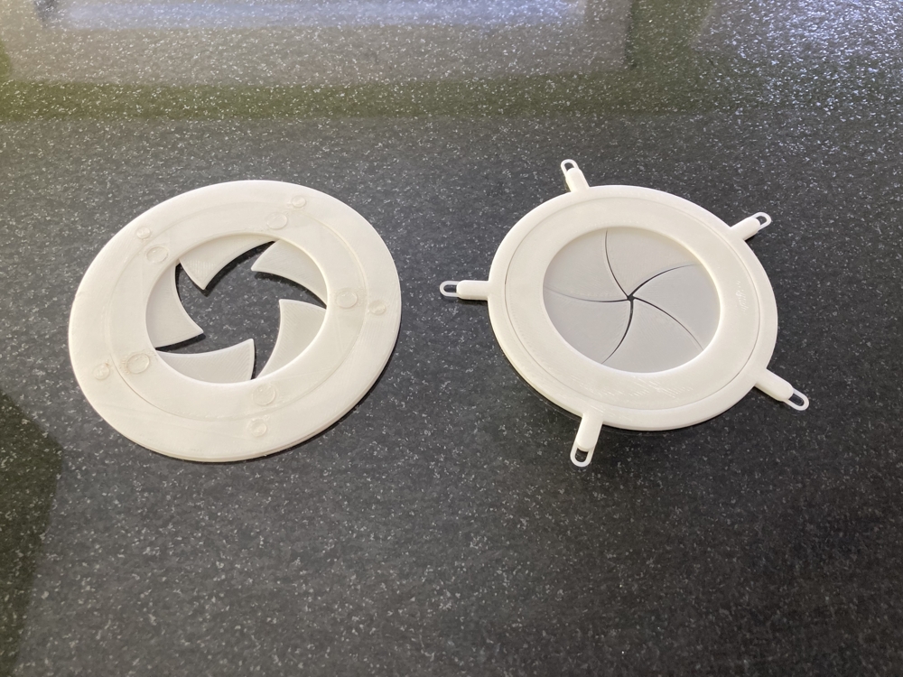 Two 3D-printed mechanical iris prototypes
